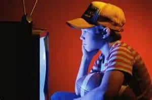 Young boy watching TV